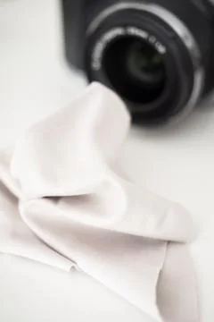 Cleaning the lens of a camera Stock Photos