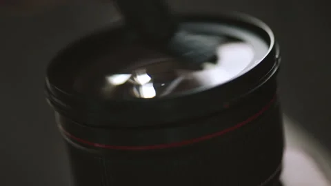 Cleaning the lens from dust. Stock Footage 138158671