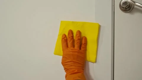 Cleaning Light Switch with Spray for Hygiene Purposes Stock Footage 308469281