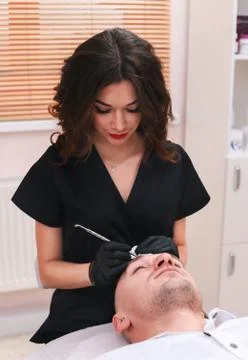 Cleaning man face. Stock Photos
