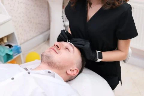 Cleaning man face. Stock Photos