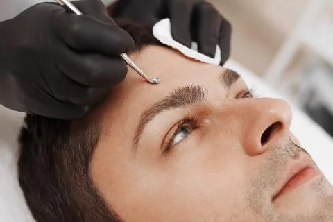 Cleaning man face. Foto stock