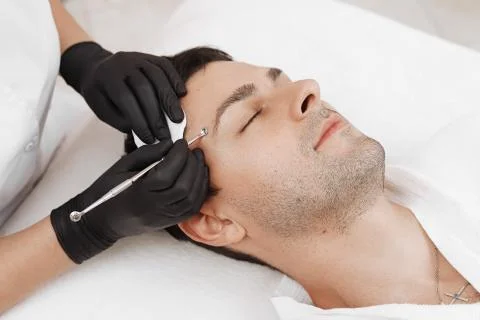 Cleaning man face. Stock Photos