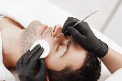 Cleaning man face. Stock Photos