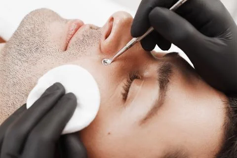 Cleaning man face. Stock Photos
