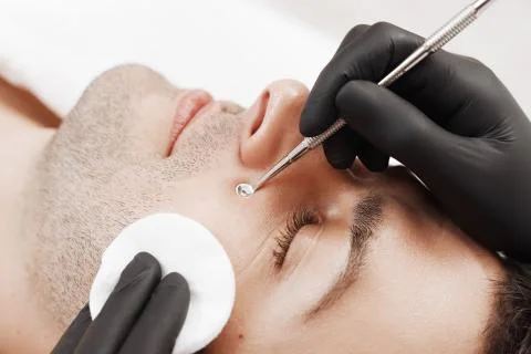 Cleaning man face. Stock Photos
