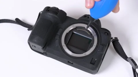 Cleaning matrix of mirrorless photo camera special brushes. dust on the matri Stock Footage 132534869
