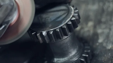 Cleaning the metal gear from rust Stock Footage 94863463