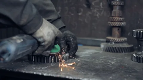 Cleaning the metal gear from rust Stock Footage 95268990