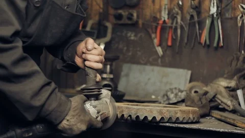 Cleaning the metal gear from rust Stock Footage 101023631