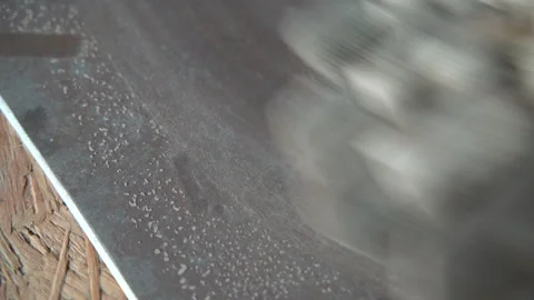 Cleaning metal panel with hand Stock Footage 161164903