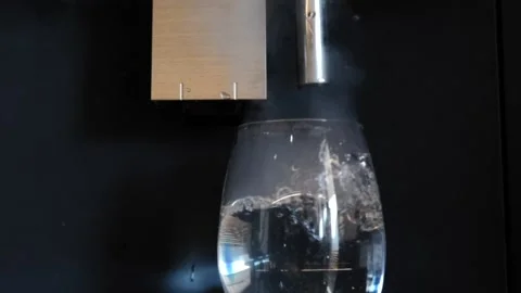 Cleaning Modern Coffee Machine with Hot Water Stock Footage 194012184