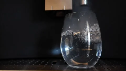 Cleaning Modern Coffee Machine with Hot Water Stockbeeldmateriaal 194012189