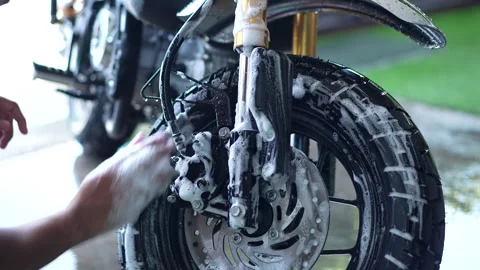 Cleaning Motorcycle at home Stock Footage 157587970
