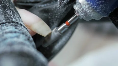 Cleaning the nail of the hand with a milling machine. Hardware combined manicure Stock-Footage 287945829