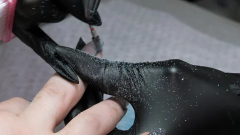Cleaning the nail of the hand with a milling machine. Hardware combined manicure Video stock 330606258