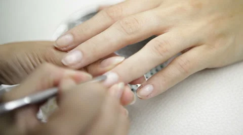 Cleaning nails of a client Stock Footage 62779764
