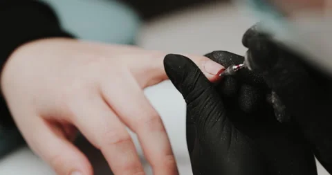 Cleaning of nails by an milling cutter. Stock Footage 149365060