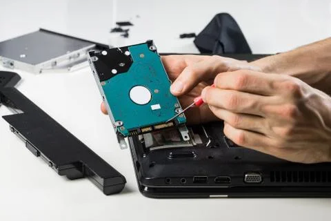 Cleaning old laptop PC Stock Photos