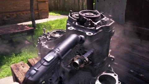 Cleaning old manual transmission from a front-wheel drive car for repair Video stock 336168945