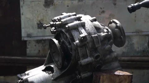 Cleaning old manual transmission from a front-wheel drive car for repair Stock-Footage 336168946