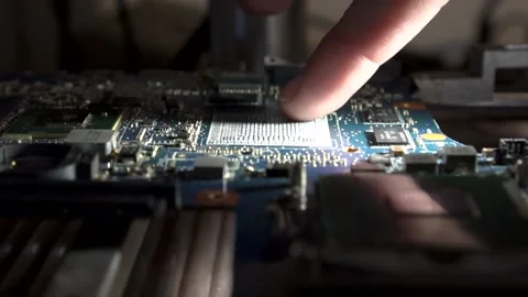 Cleaning from the old microchip on a special device Stock Footage 142375378