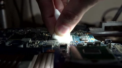Cleaning from the old microchip on a special device Stock Footage 142375397