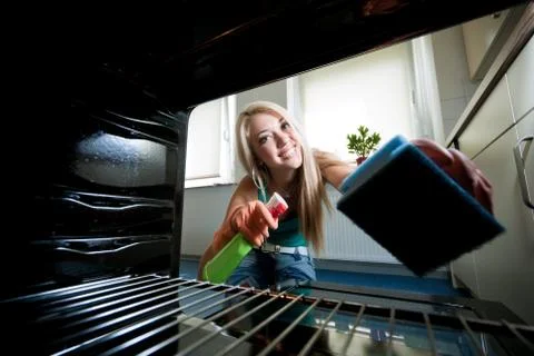 Cleaning The Oven Stockfoto's