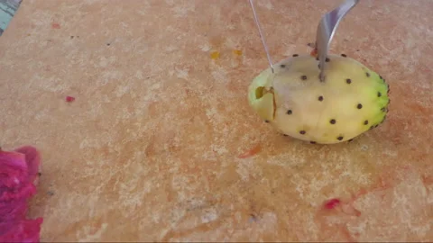 Cleaning peeling prickly pears fruit Stock-Footage 138094066