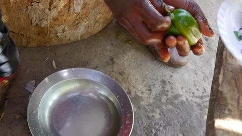 Cleaning up pepper and machete Stock Footage 80462426