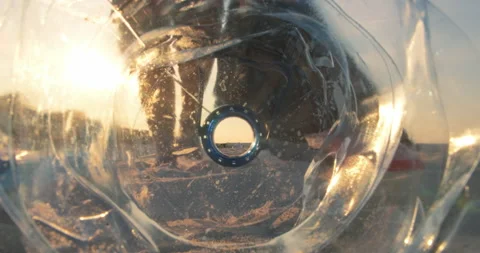 Cleaning plastic from the sandy beach at sunset. Stock Footage 171858682