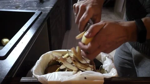 Cleaning of potato from the skin. Stock Footage 145157243