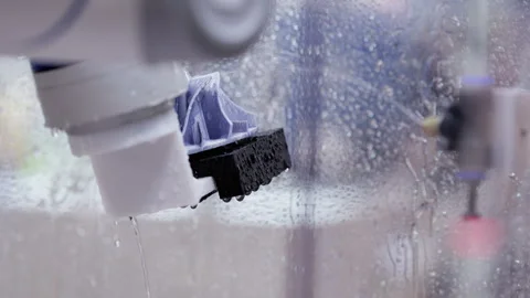 Cleaning process of modern machine tool operating details with clear water jet Vídeo Stock 346610707