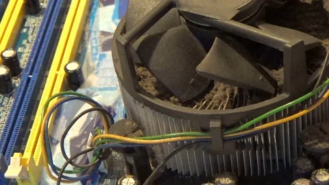 Cleaning a processor fan with a brush Stock Footage 79096457