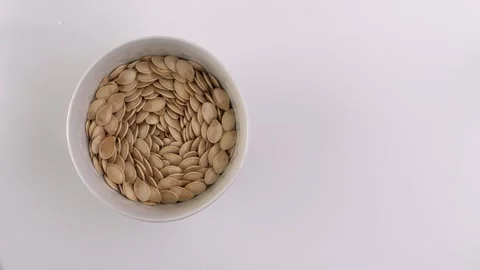 Cleaning pumpkin seeds Stock Footage 317457258