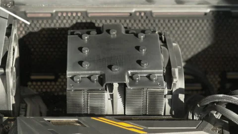 Cleaning the radiator of computer cooling system with compressed air close-up Stock Footage 230989177