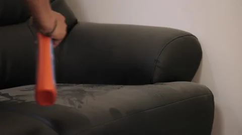 Cleaning - Removing Dust from a Sofa Video stock 56090589