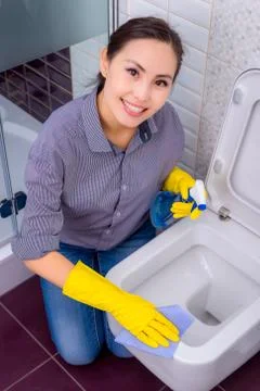 Cleaning in the restroom Stock Photos