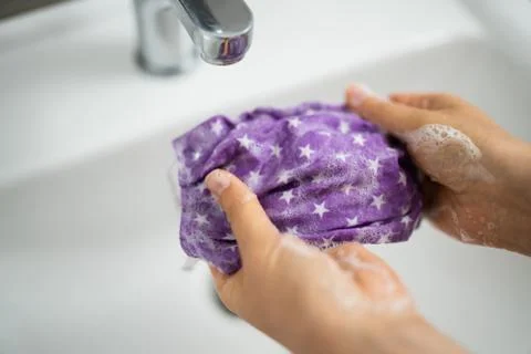 Cleaning Reusable Face Mask Stock Photos