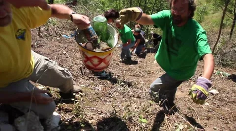 Cleaning a river and team building in the nature Stock Footage 47148418