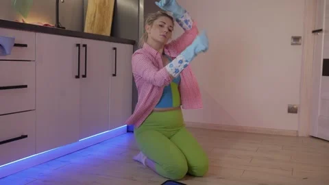 A Cleaning Routine Enjoying Bright and Colorful Moments in a Modern, Stylish Stock Footage 306159565