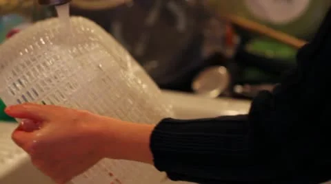 Cleaning the salad spinner Stock Footage 21466552