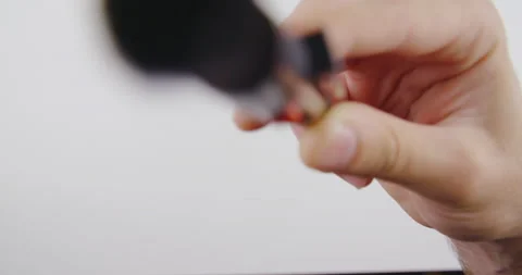 Cleaning sensor on digital camera with soft brush, first person view. Stock Footage 138050316