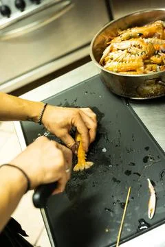 Cleaning shrimp in the kitchen Stock Photos