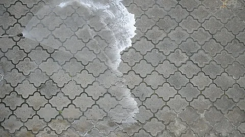 Cleaning the sidewalk with high pressure solution during coronavirus 스톡 동영상 127693130