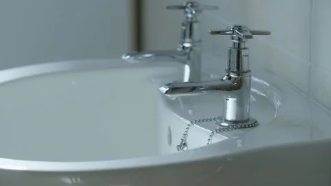 Cleaning a sink/tap - Corona Virus Prevent Spreading / Epidemic Stock Footage