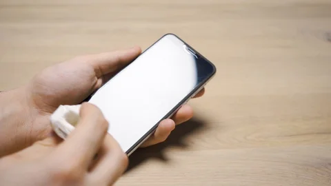 Cleaning Smart Phone Display Stock Footage 128155213