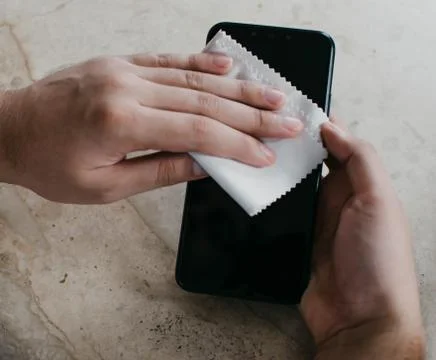 Cleaning smartphone Stock Photos