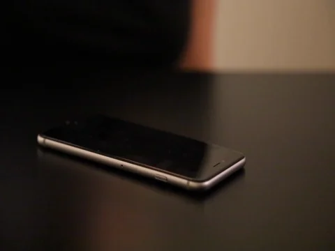 Cleaning smartphone woman's hands Stock Footage 73834477