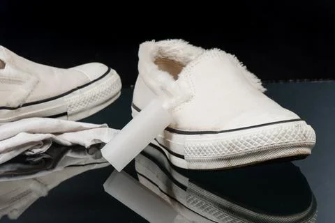 Cleaning the sneaker Stock Photos